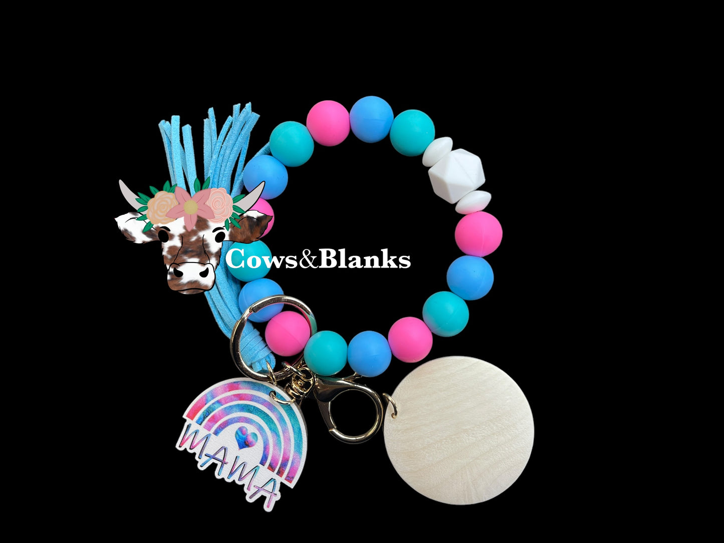 Mama! Bright Pink, Green and Blue Silicone Stretch Beaded Wristlet Bracelet Keychain with a Wooden Tie-Dye Rainbow Mama Charm Accented with White Silicone Beads, Gold Hardware, a Matching Tassel, and a Wooden Disc
