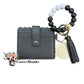 Wallet/Wristlet with Solid Black Cardholder and a Silicone White and Black Wristlet with Wooden Accent Bead