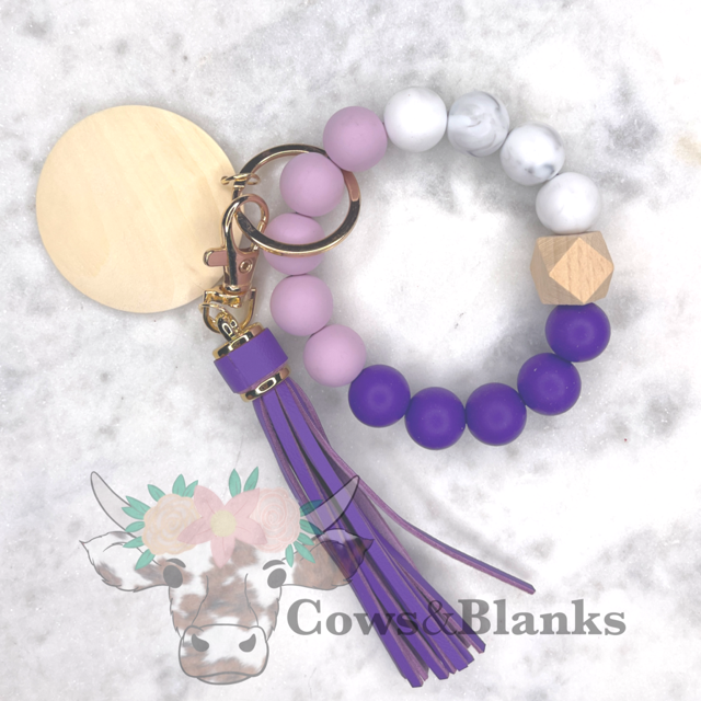 Marbled Pastels and Grays Stretch Silicone Wristlet Bracelet Keychain with Wooden Disc and Tassel