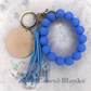 Solid Colored Silicone Wristlet Bracelet Keychain with Wooden Disc and Tassel