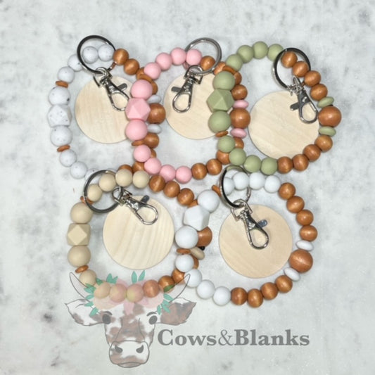 BILAYERED WOOD BEADED STRETCH WRISTLET BRACELET WITH WOODEN DISC