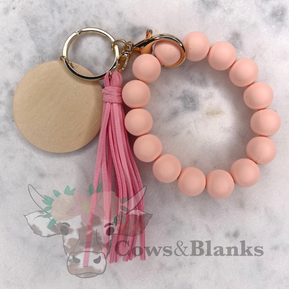 Solid Colored Silicone Wristlet Bracelet Keychain with Wooden Disc and Tassel