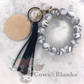 Solid Colored Silicone Wristlet Bracelet Keychain with Wooden Disc and Tassel
